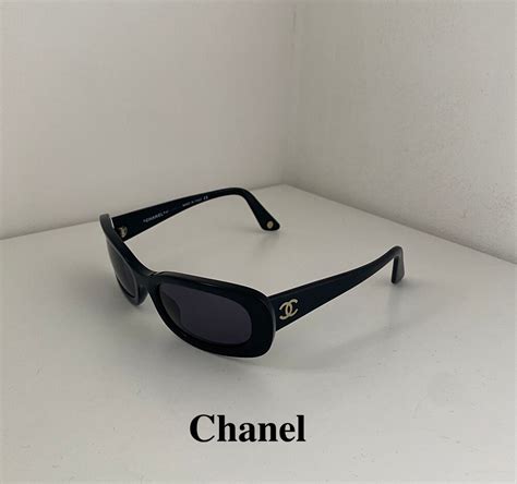 black chanel sunglasses with chanel on the top|chanel sunglasses vintage.